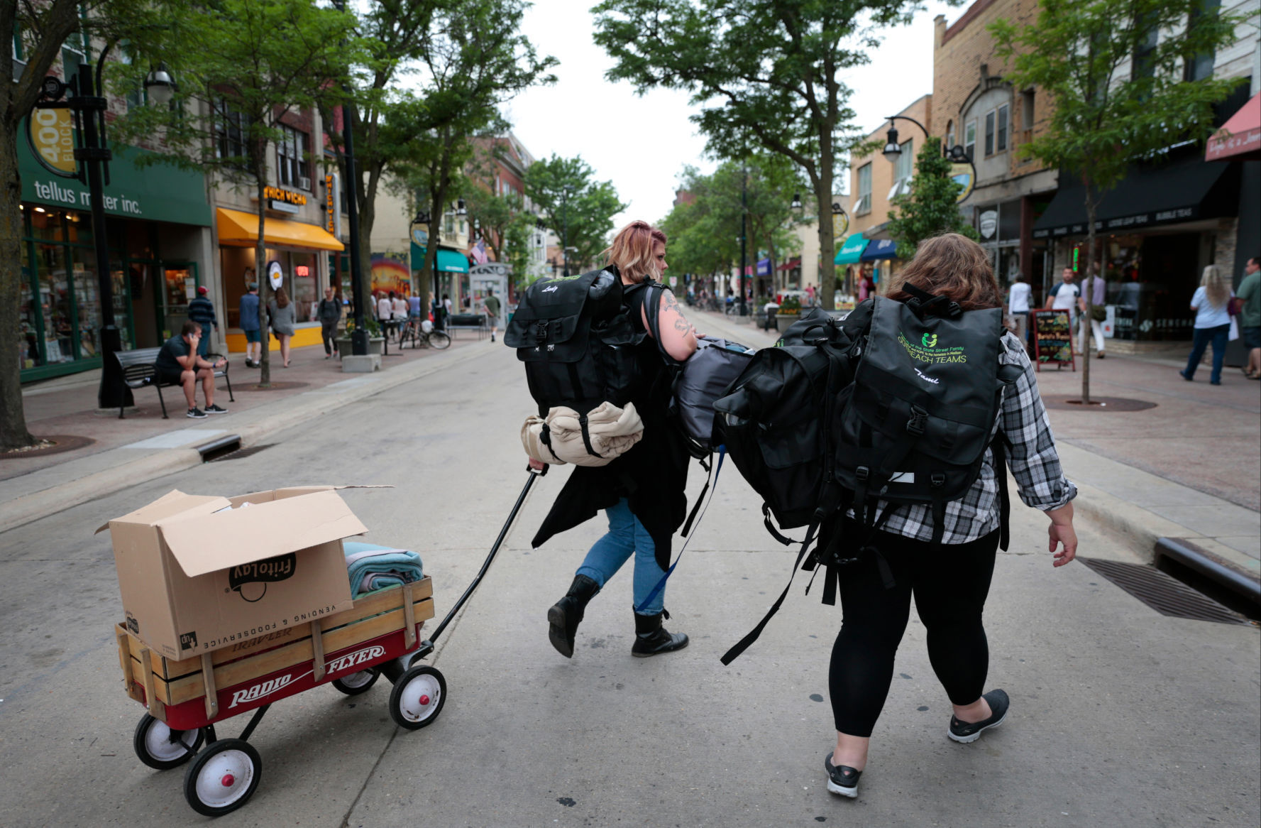 Outreach workers with wagon